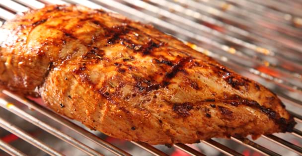 Chicken fillet on the grill.