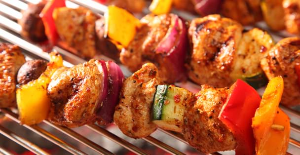 Chicken kabobs on the grill.